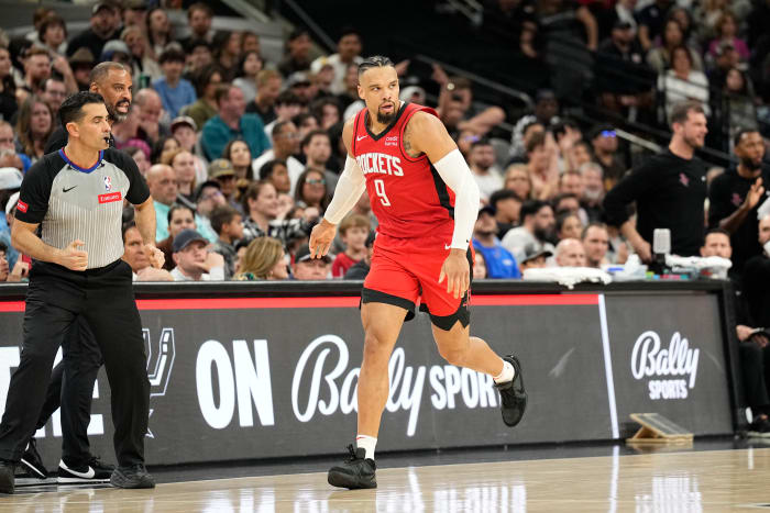 Rockets forward Dillon Brooks (9) reacts after scoring a three-point basket during the second half against the San Antonio Spurs at Frost Bank Center.